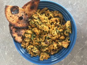 Masala Scrambled Egg: tasty spices and wilted spinach creates a twist on the classic scrambled egg.